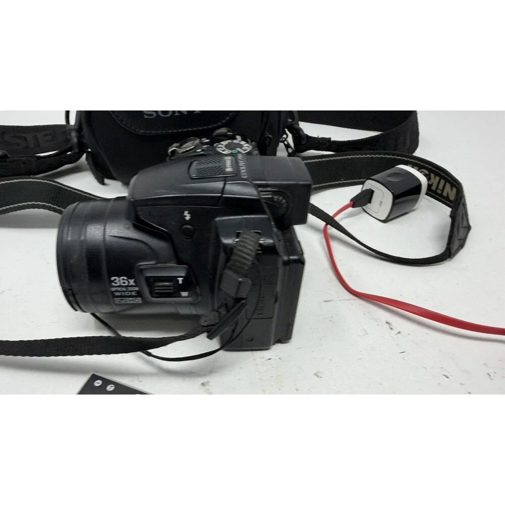 Nikon COOLPIX P500 36X Zoom 12.1MP Tilt Screen Digital Camera - Bundle - Nice